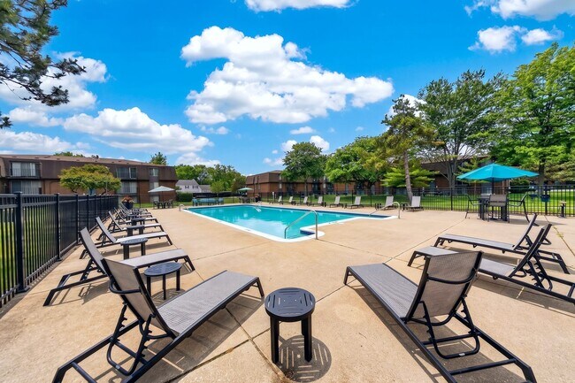 Heated pool and sundeck at Drawbridge Apartments in Harrison Township, MI.
