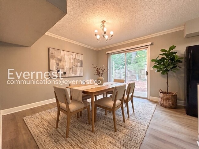 Photo - PROMO: Get $500 Off first full month’s rent! / Charming 3-Bedroom Townhome with Modern Amenities ...