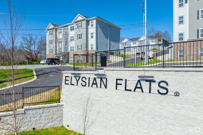 Entrada a los pisos elíseos - Elysian Flats Apartamentos