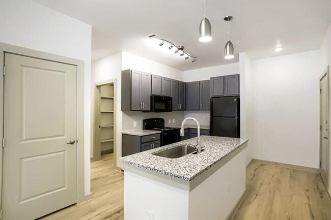kitchen with view of front door and closet - Cleveland Pioneer Crossing