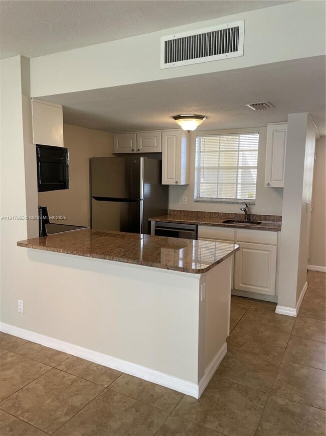 Building Photo - 6323 La Costa Dr Unit A Rental