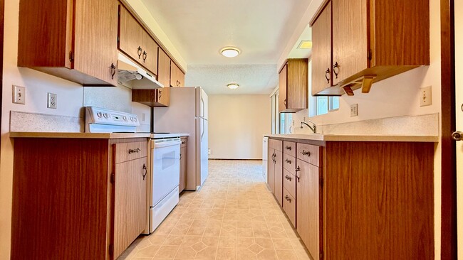 Photo - Two Bedroom Townhome with Yard & Attached ...