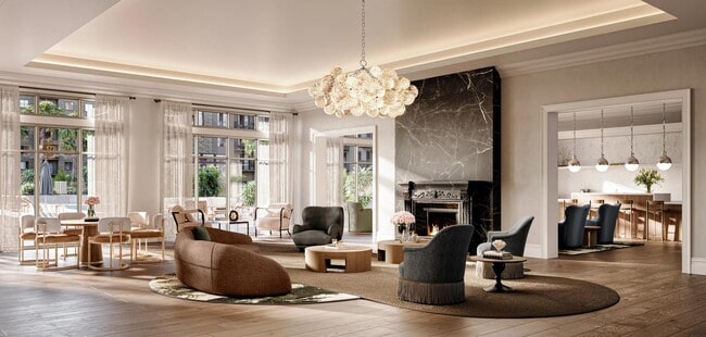 Thoughtfully designed gathering spaces with flexible seating, integrated work areas, and inviting finishes. - Modera Walsh Heights