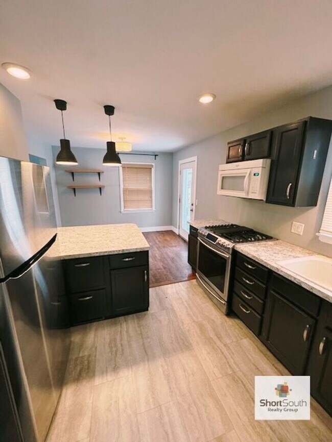 Photo - Updated - 3 bed 1.5 bath, with a detached garage