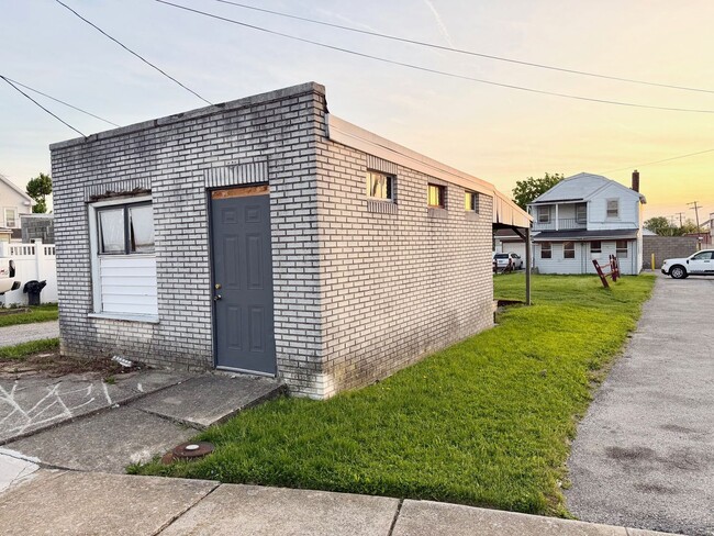 Photo - Cozy 2–3 Bedroom, 1 Bath Home with Garage & Sunroom