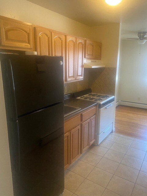 Kitchen 2 - 118 E 24th St Unit Apt A1