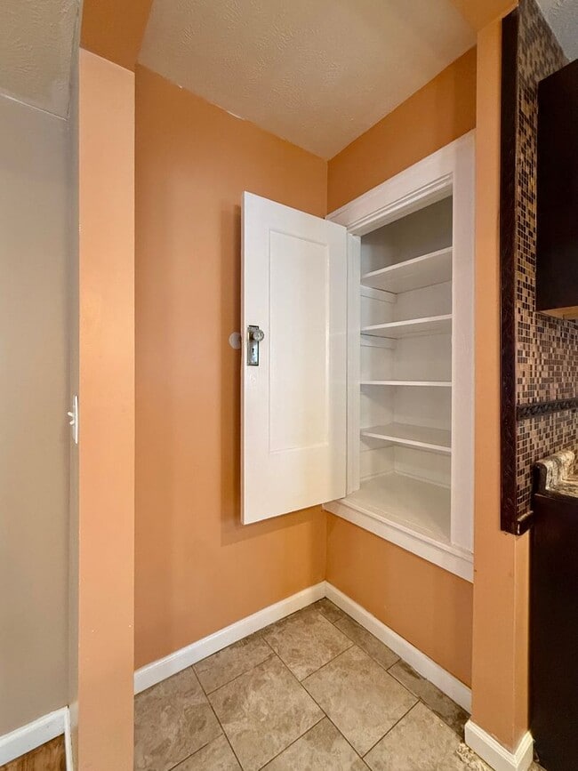 Photo - Bright West End Home with Enclosed Porch, Fenced Yard & Garage