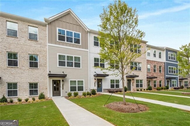 Photo - 5489 Blossomwood Trl Townhome