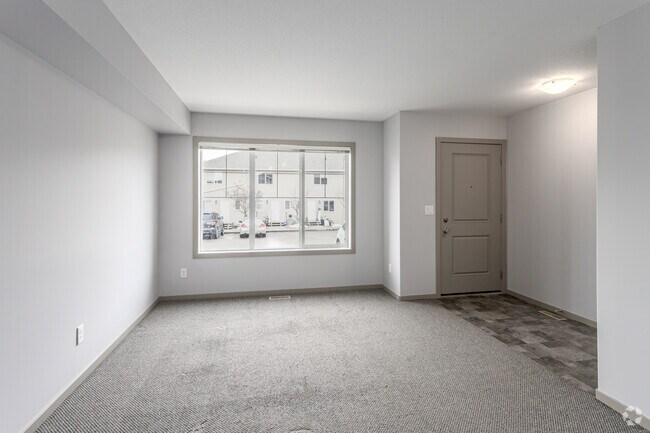 2 chambres, 3 salles de bain - 1132 pi² (+566 pi² au sous-sol) - - Belmont Village Townhomes