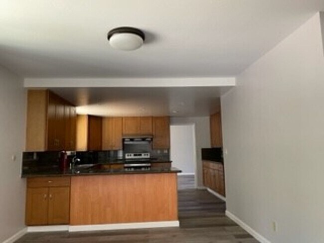 Photo - -Spacious 4 Bed 2.5 Bath, House, with Hew Hardwood Floors throughout -