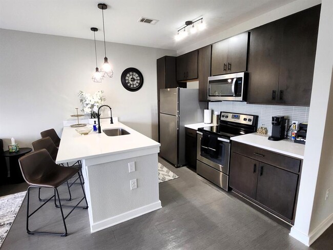 Building Photo - 2505 Thornton Rd Unit 2307