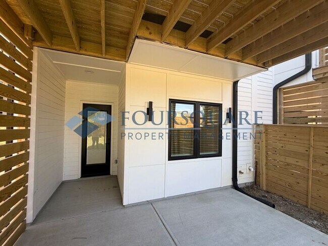 Photo - Spacious New Construction 4-Bed, 4-Bath Townhome with Modern Finishes, Fireplace & Fenced Yard | ...