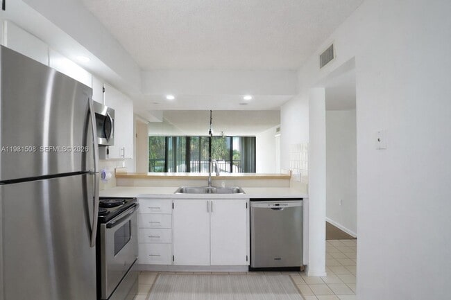 Building Photo - 2761 Village Blvd Unit 304