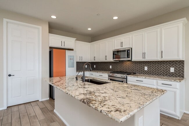 Photo - Amazing 4BR 2.5BA Home w/ 3-Car Tandem Garage • Pool Access • Yard w/ Fire Pit in Saguaro Trails