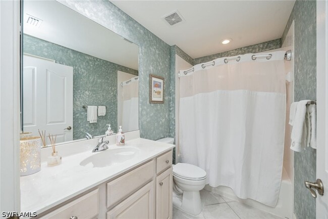 Building Photo - 8200 Saratoga Dr Unit 401