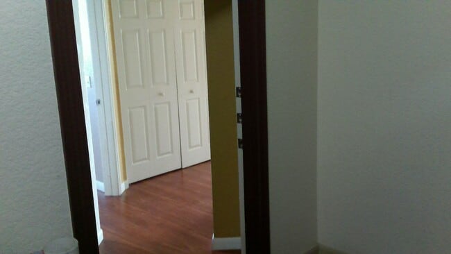 Photo - Beautiful 1/1 corner unit with upgraded wood floors a large balcony with an Orange Avenue view.