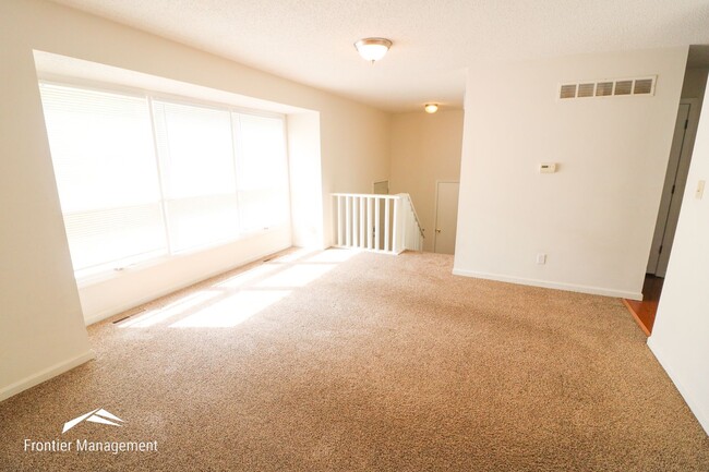 Photo - Spacious 3 bedroom townhome with a fenced in backyard!