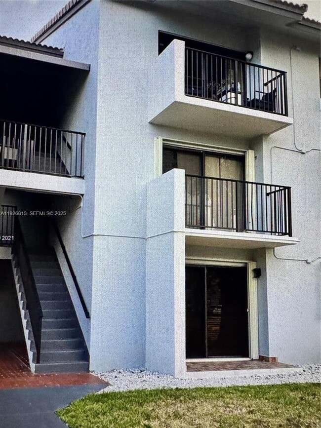 Building Photo - 7130 NW 179th St Unit 108