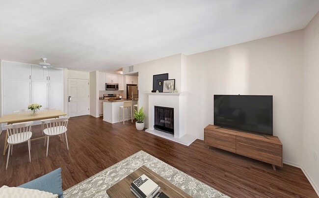 Renovated Package I kitchen, dining, and living area with hard surface flooring