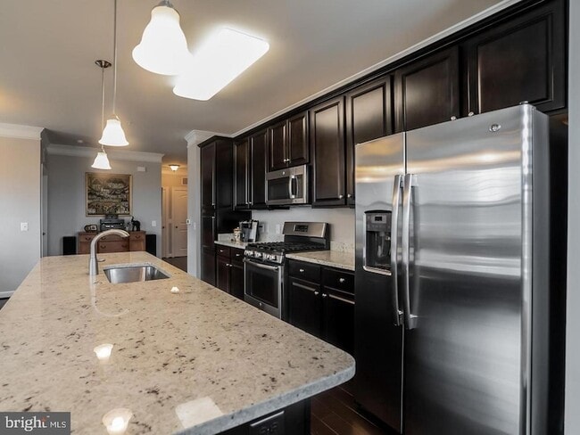 Photo - 13722 Neil Armstrong Ave Unit 308