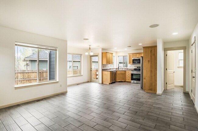 Photo - Cozy 3 Bed Home: New Carpet, Fully Fenced Yard & Near Old Mill