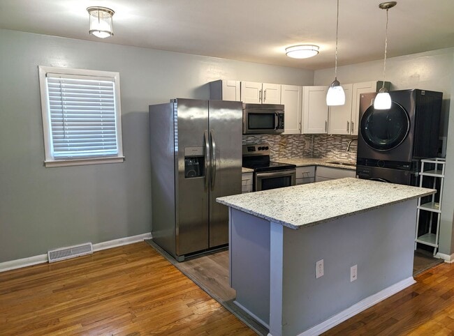Photo - Minutes from UPTOWN! 4 Bedroom!  100% Remodeled!