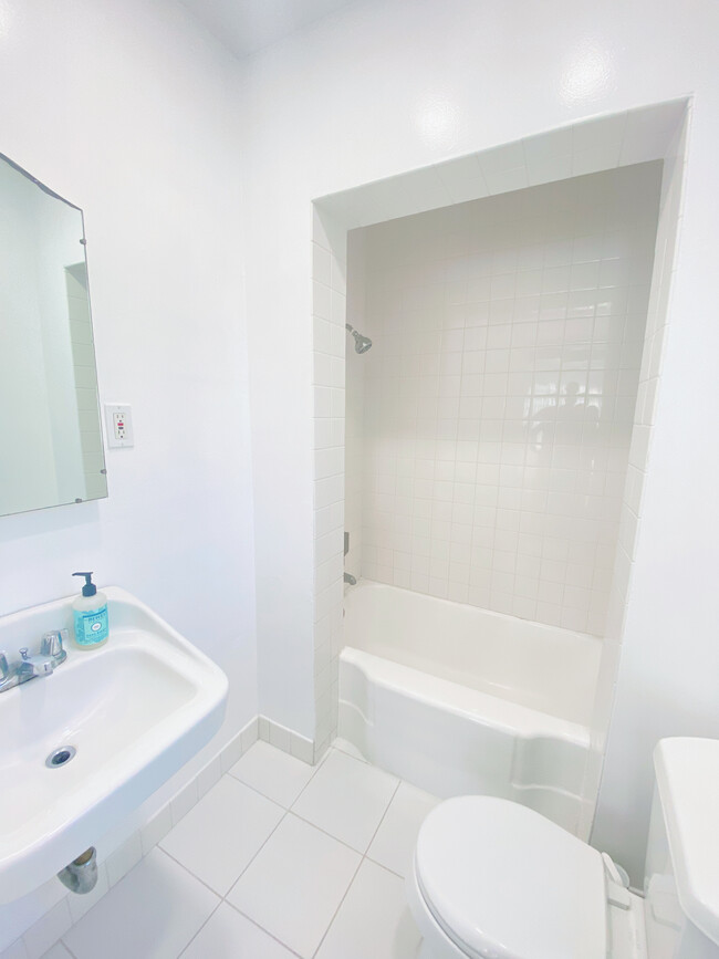 Upgraded bathroom - 5819 E Ocean Blvd Apartments Unit 5819 E. Ocean Blvd.