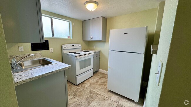 Building Photo - Renovated 1-bedroom attached studio with p... Rental