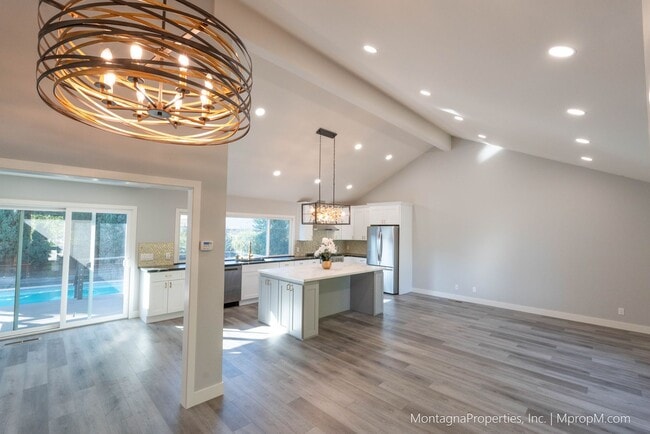 Photo - Spacious custom 4 bedroom home with pool and 2 car garage!