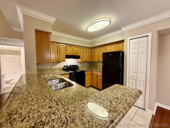 Building Photo - 15135 Michelangelo Blvd Unit 208