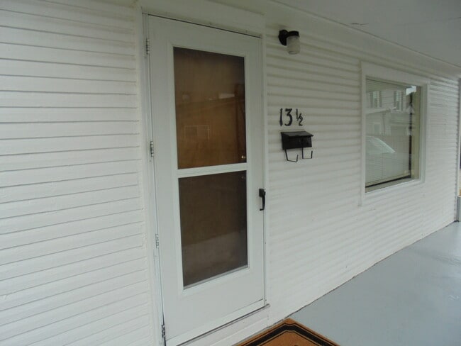 13 1/2 W Center St