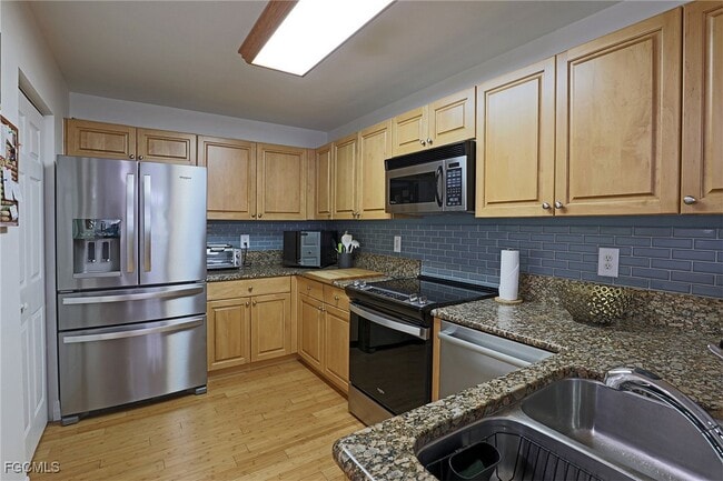 Building Photo - 15460 Bellamar Cir Unit 2712