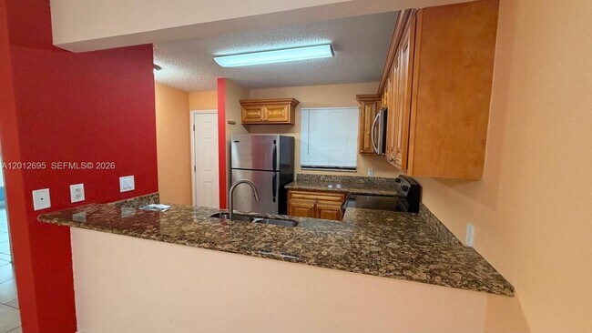 Photo - 1760 Windorah Way Unit H