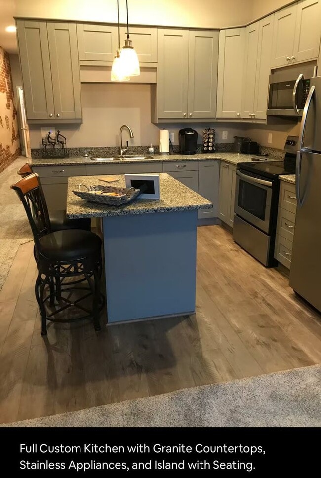 Building Photo - Experience the Lofts Collective Unit Colborn Suite