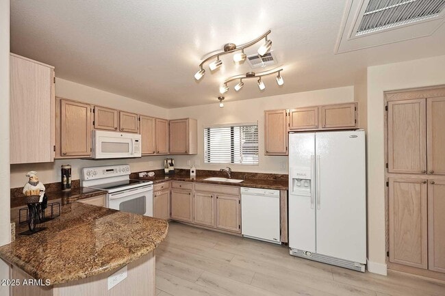 Building Photo - 15050 N Thompson Peak Pkwy Unit 1033