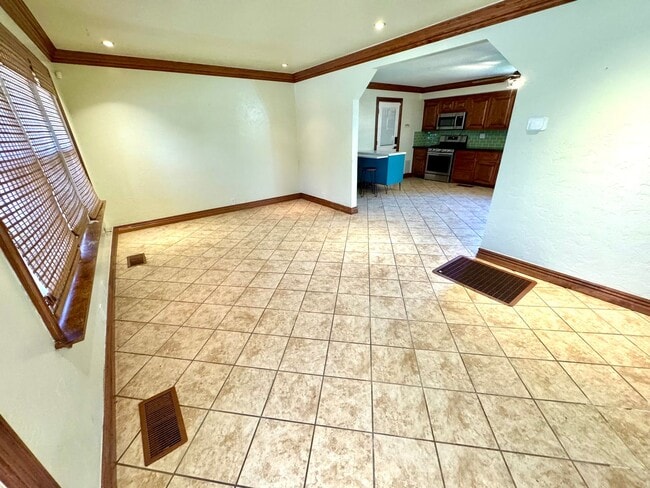 Photo - Charming Bungalow with Large Fenced Backyard, Shed & Great Central Location!