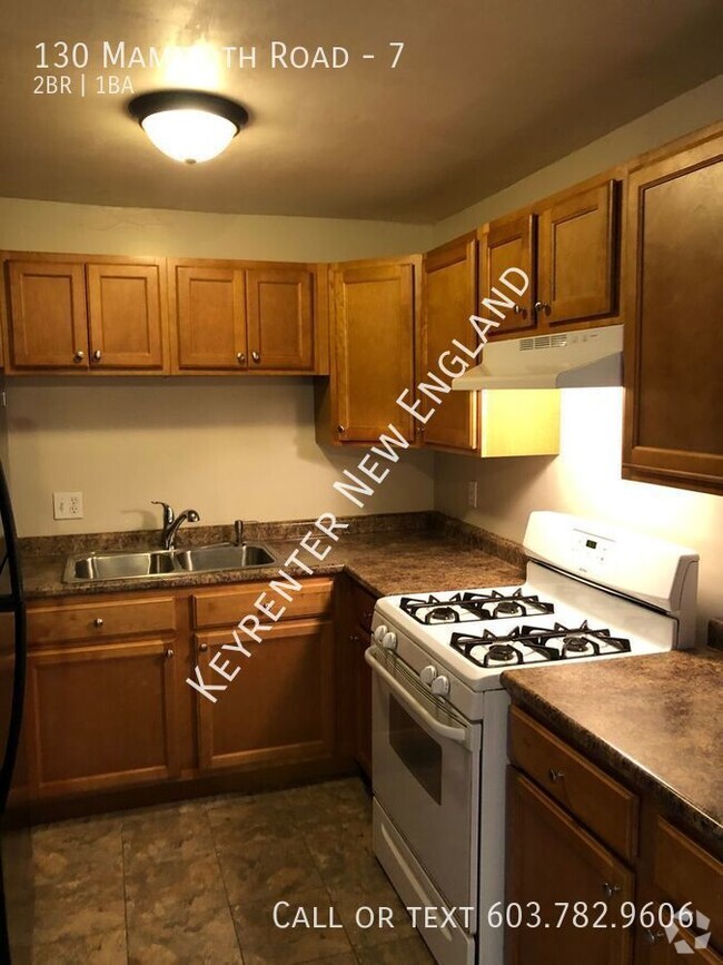 Building Photo - Updated 2 Bedroom, ground floor location a... Unit 7 Rental