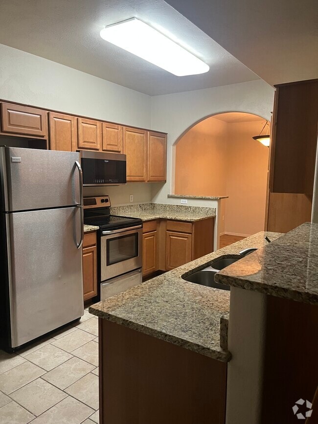 Building Photo - 2550 E River Rd Unit 1105 Rental