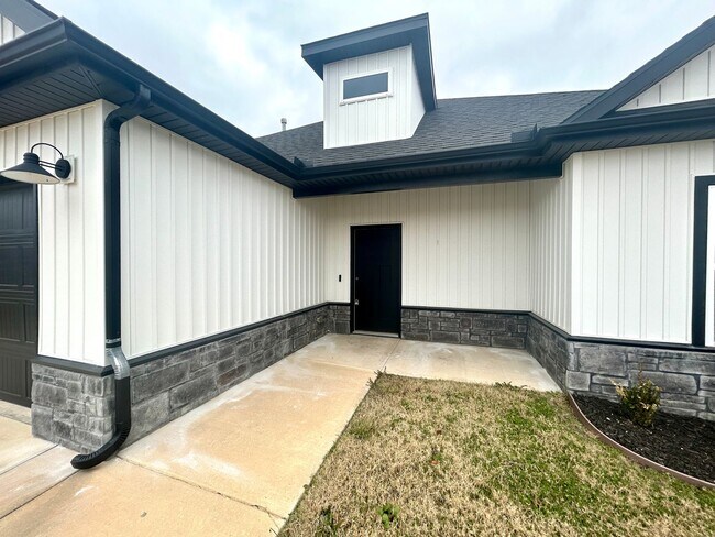 Photo - Centerton Home Available NOW! 4 bed, 2 full bath no carpet home. LARGE fenced backyard