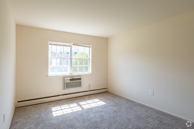 2BR, 1.5BA - 908-957SF - Bedroom 1 - Windsor Regency Apartments