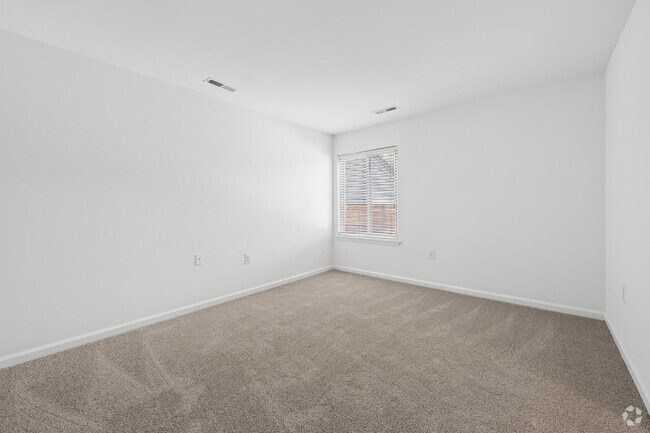 3BR, 2BA w/ Den - 1,115SF - Primary Bedroom