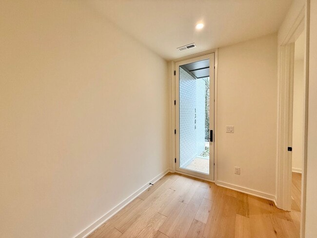 Photo - Luxurious New Construction 4BD, 2.5BA Raleigh Townhome with a Rooftop Terrace in a Prime Location...