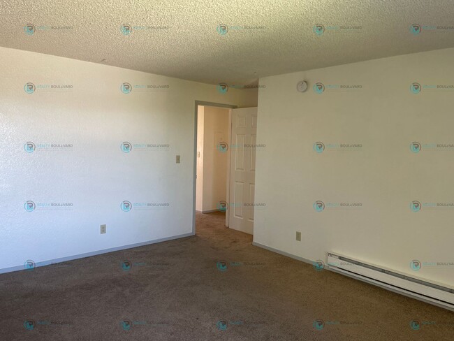 Photo - This delightful 2-bedroom, 1-bathroom condo perched upstairs offers an irresistible opportunity y...