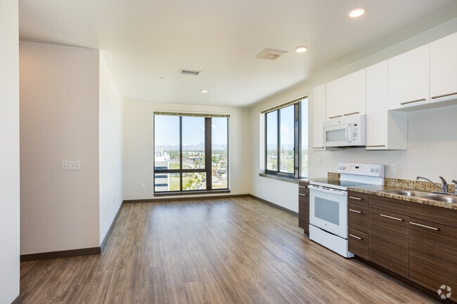 2BR, 2BA - 952SF - Kitchen / Living Room