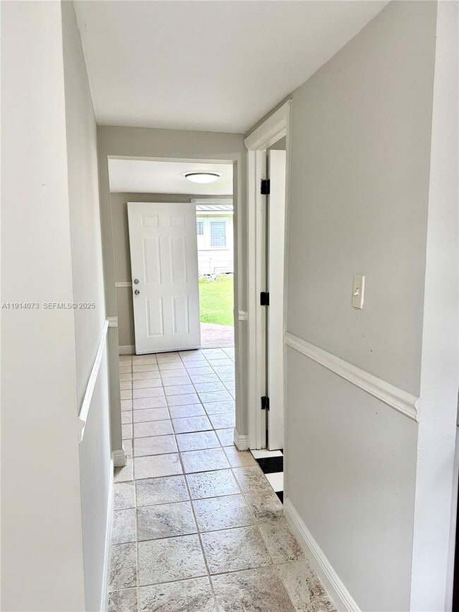 Photo - 1350 SW 13th St Unidad Rear-Ground Floor