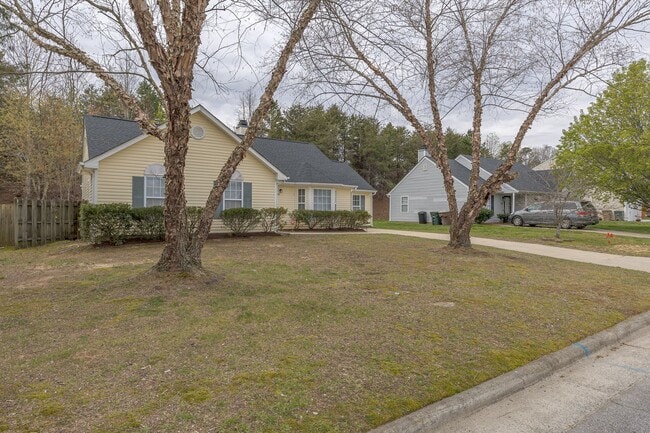 Photo - Beautiful 4 bed 2 bath home in Greensboro with fenced yard. Walk to coffee shop and restaurants.