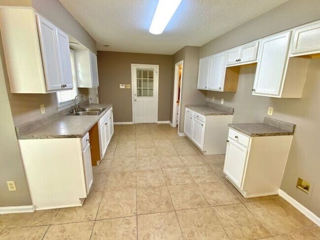 Photo - Now Leasing 4 bedroom 2.5 bath home-Southeast Memphis