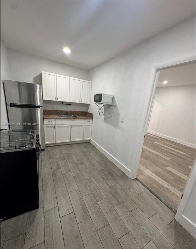 Building Photo - 5860 NW 193rd St Unit 1