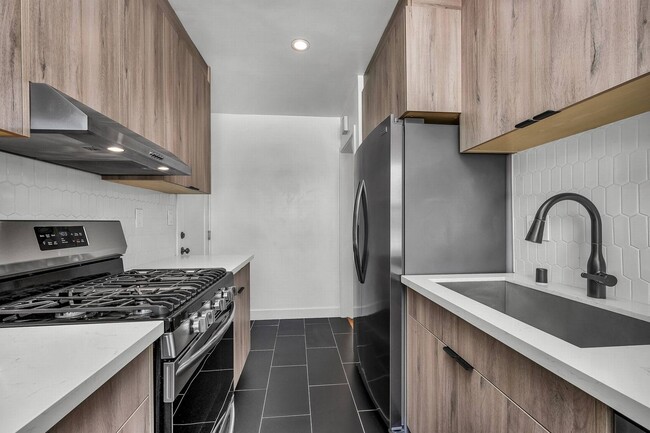 Building Photo - Designer remodeled Unit 107