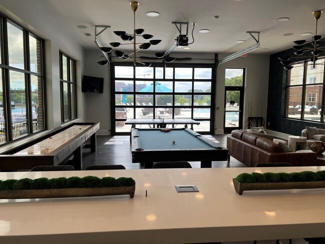 Gameroom with billiards and shuffle board